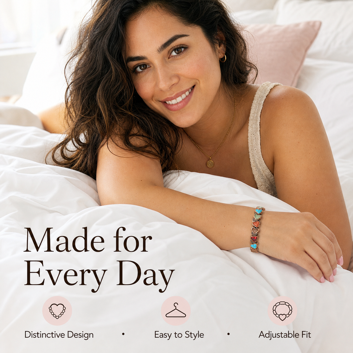Latina woman styling the Aura bracelet in a bright morning bedroom