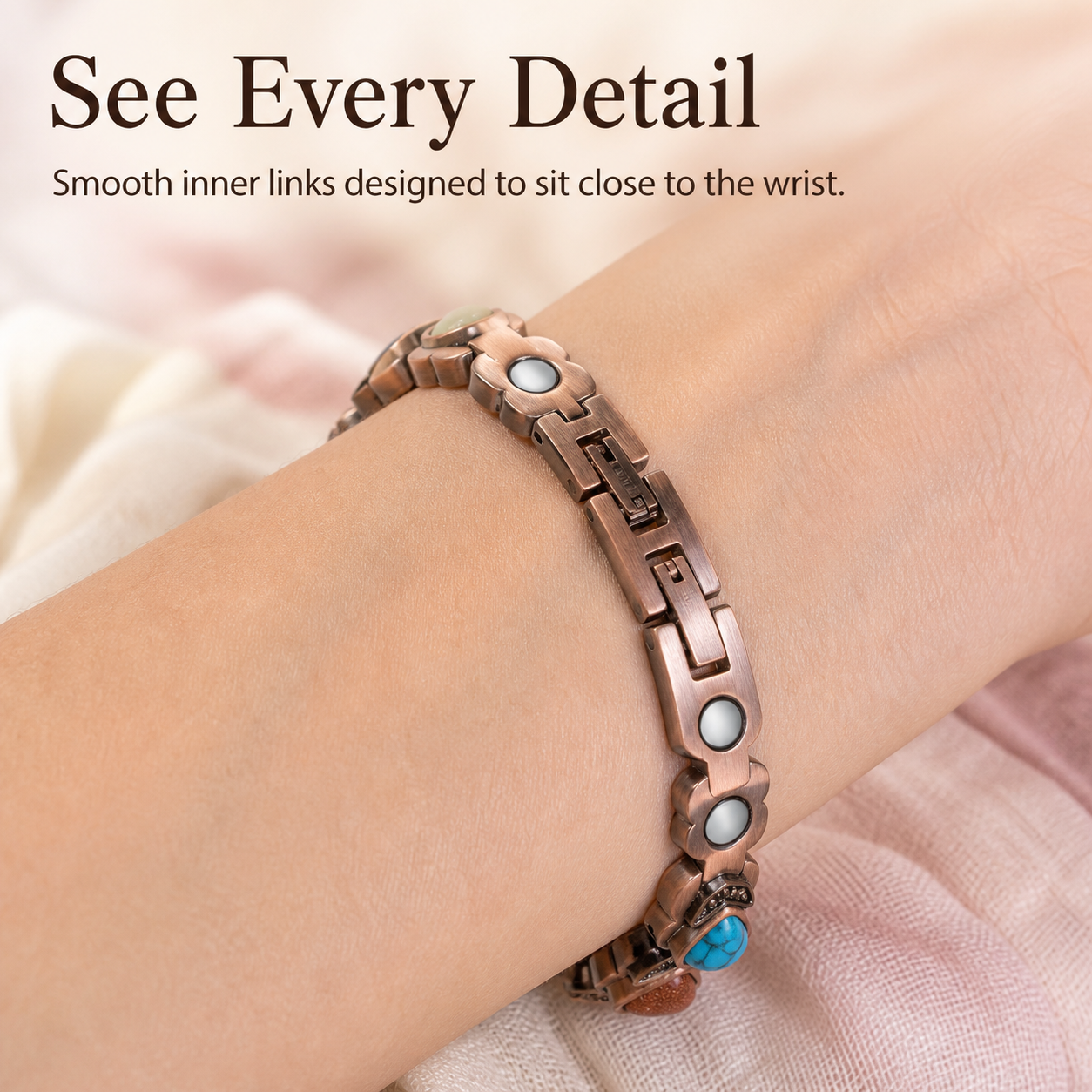 Close view of the Aura bracelet inner links and round nodes