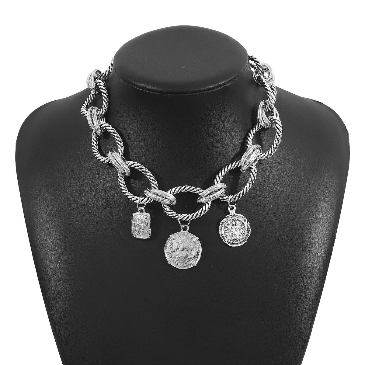 All-silver-tone twisted-link necklace with three coin-style charms