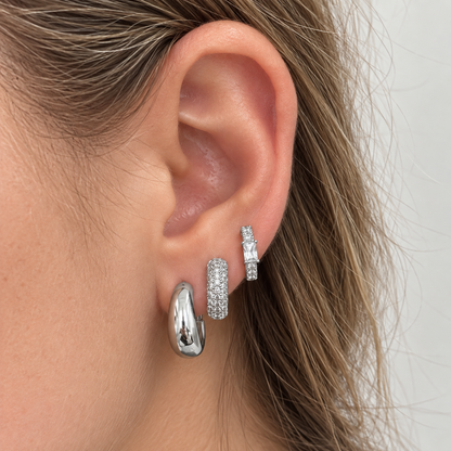 Close on-ear view of the Silver Tone three-piece earring stack