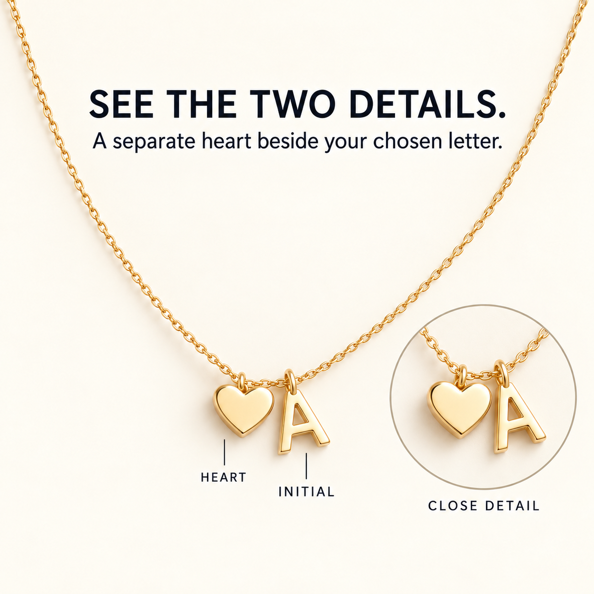 Close-up of separate heart and initial charms