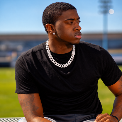 Styling visualization: silver-tone Cuban link chain outdoors