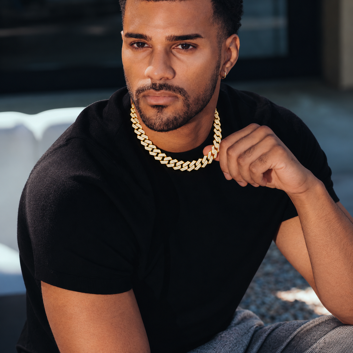 Styling visualization: gold-tone Cuban link chain with black tee
