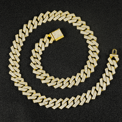 Gold-tone Cuban link chain on black background