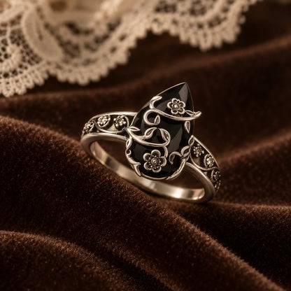 Exact ring displayed on burgundy velvet