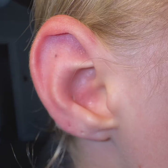 Customer-style video showing the Gold Tone earring stack on ear