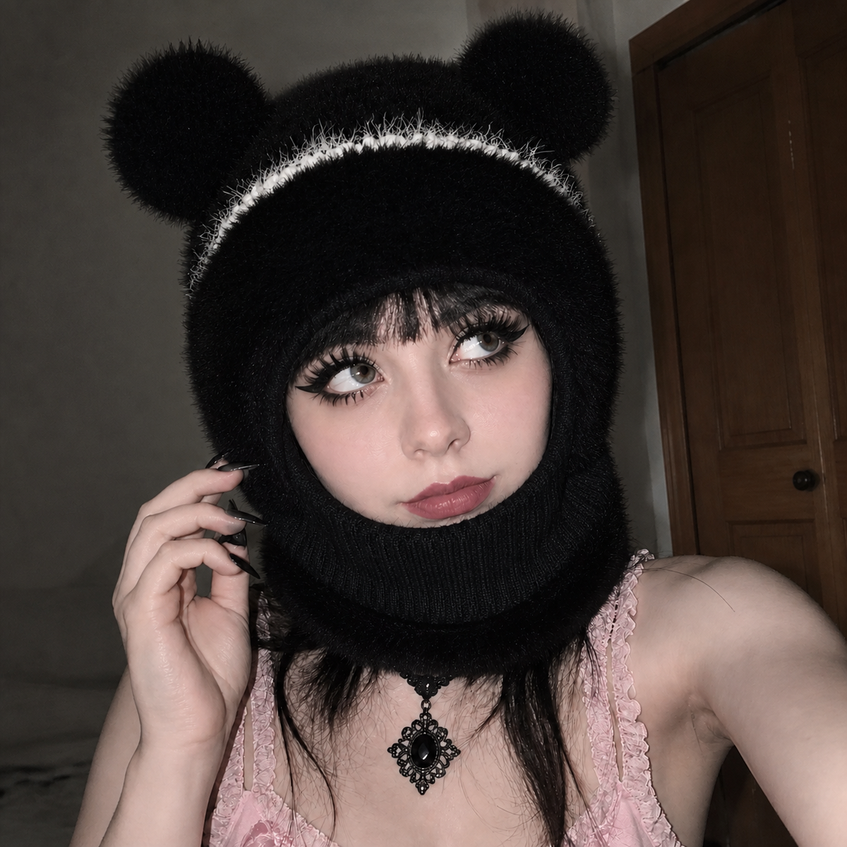 Goth-styled woman wearing the black Teddy Bear Balaclava in a flash selfie