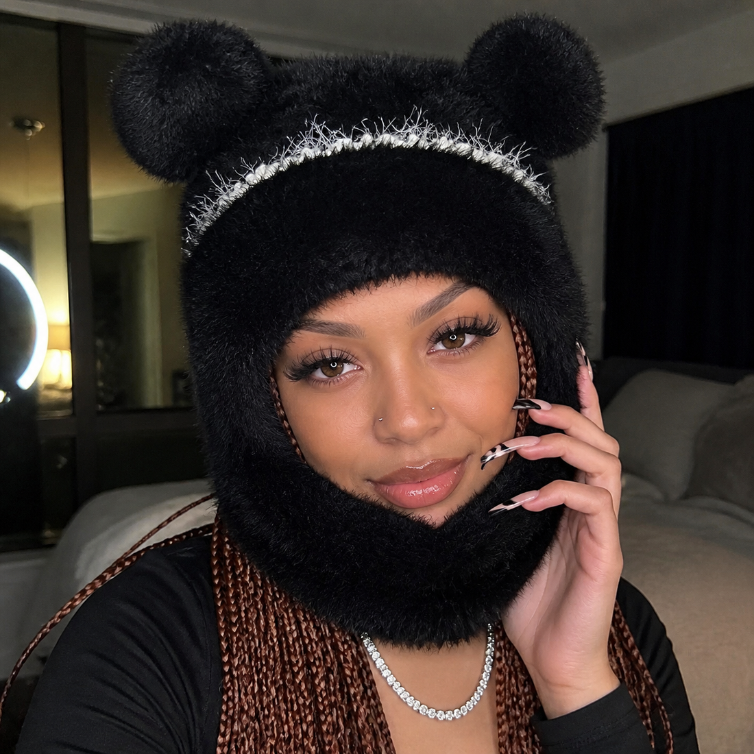 Woman wearing the black Teddy Bear Balaclava in a bedroom selfie
