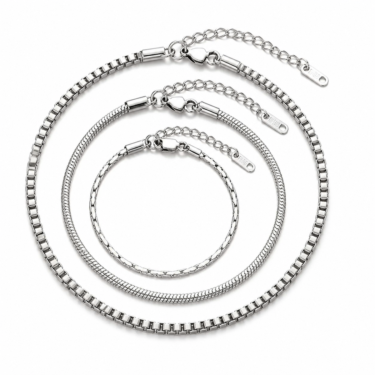 Three separate Veyron silver-tone bracelets arranged on a clean white background